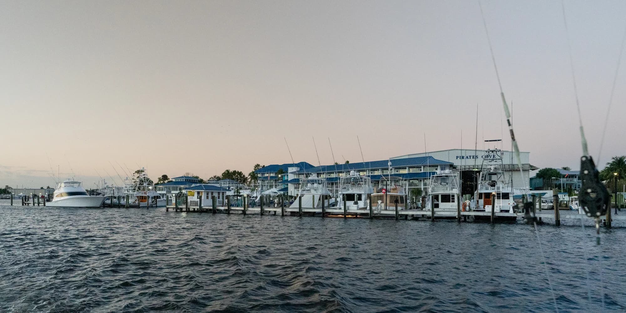 Pirate's Cove Marina at dusk with tournament boats - 2024